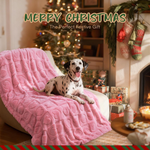 Pink fluffy fleece pet blanket with a dog by the Christmas tree